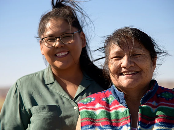 Tiffani Begay and Ida Begay receive donations on the Navajo Nation in early June from the University of Arizona Cancer Center food and supply drive.