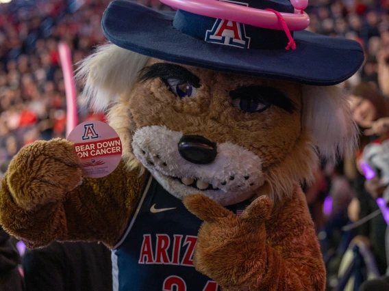 UArizona Mascot holding magnet