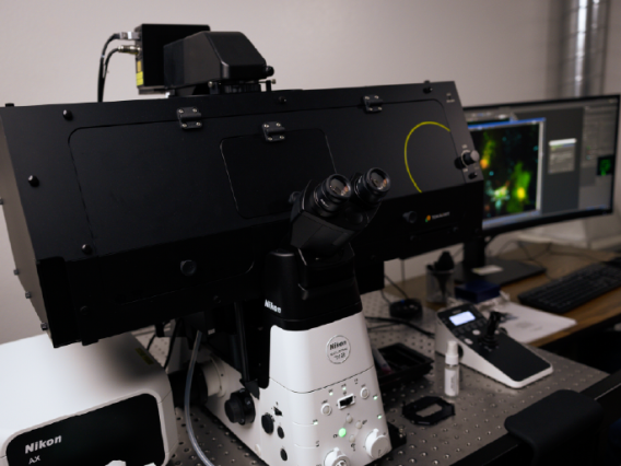Nikon AXR Microscope alongside microscopic slide