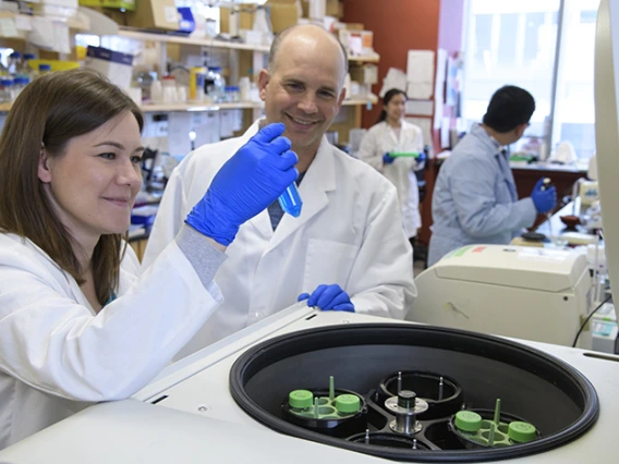 Michael Kuhns with graduate student researcher