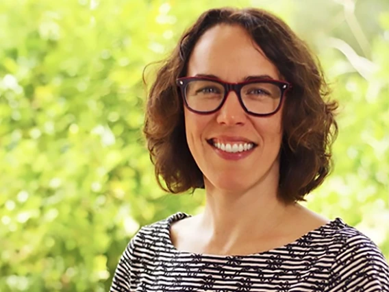 Melanie Hingle smiles in a photo outdoors.