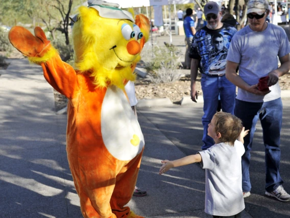 Ray hugging a kiddo