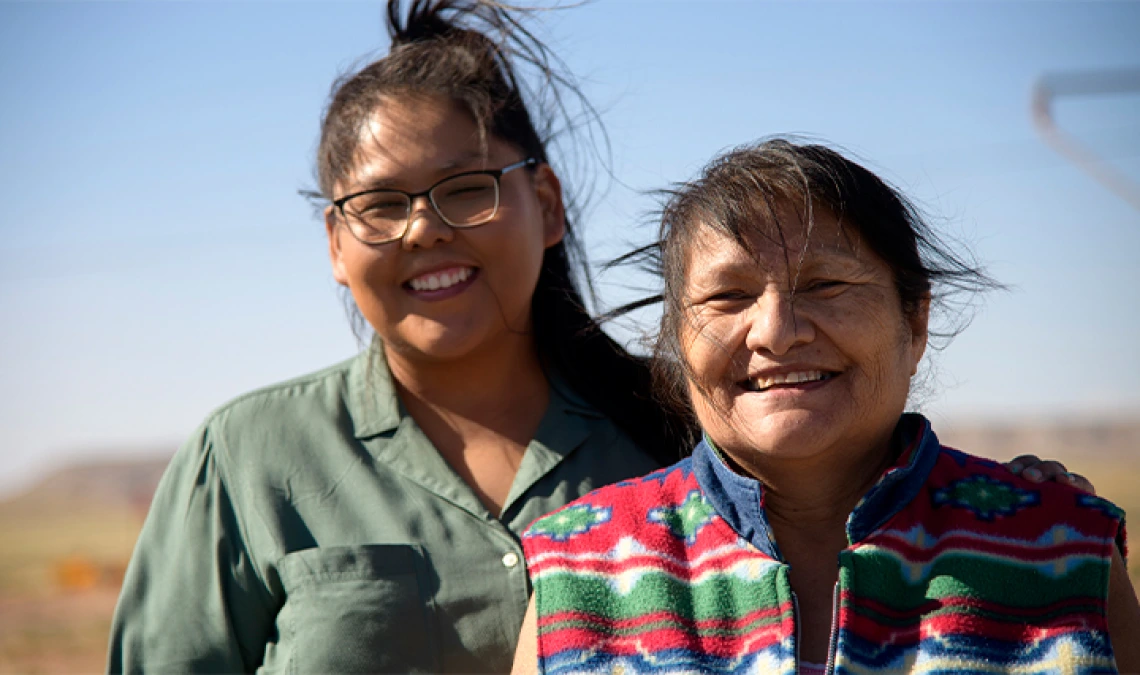 Tiffani Begay and Ida Begay receive donations on the Navajo Nation in early June from the University of Arizona Cancer Center food and supply drive.