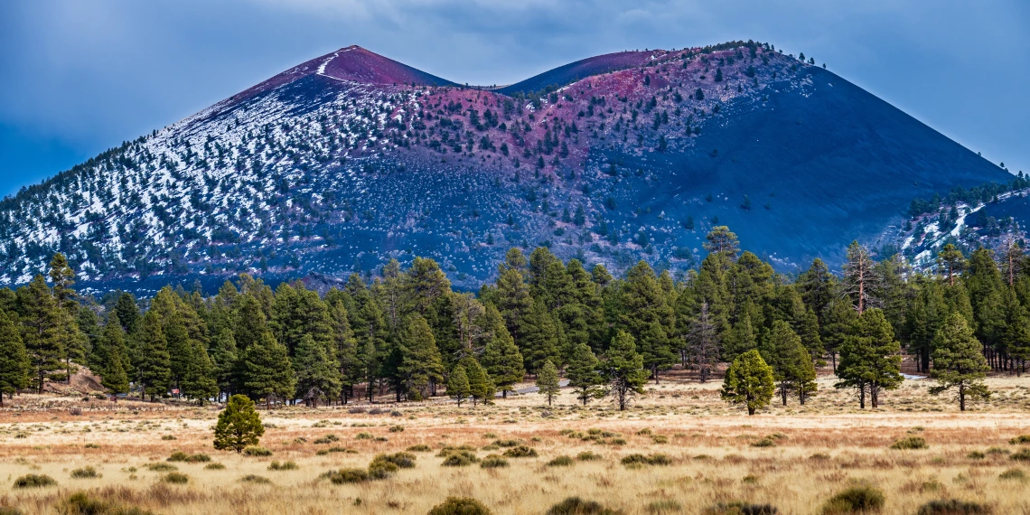 Humphrey's Peak at sunset from a field below.