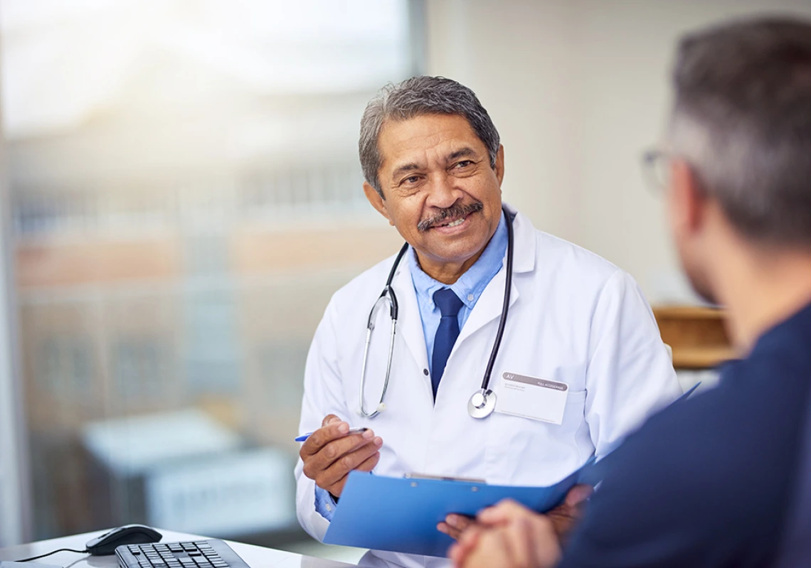 Clinician Speaking to Patient