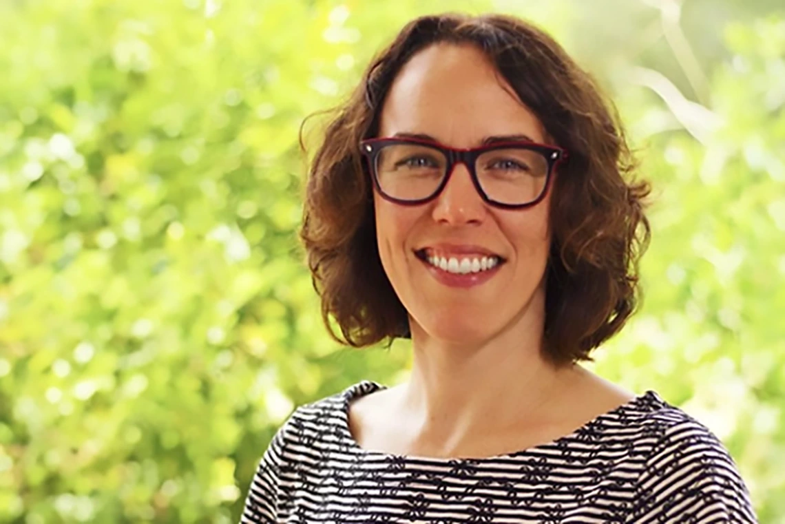 Melanie Hingle smiles in a photo outdoors.