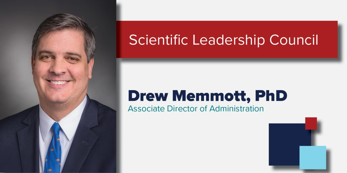 Portrait of Drew Memmott accompanied by his name and title.