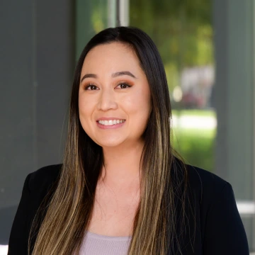 Photo of Lisa Tran smiling.