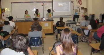 SASS teachers give a lesson in a class.