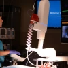 Surgeon Stephanie Worrell operates a robotic machine in a surgery room of Banner Health and the University of Arizona