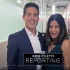 Nick Ciletti poses with Rachna Shroff in a UACC hallway.