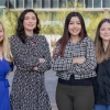 Four women stand in front of the BIO5 center.